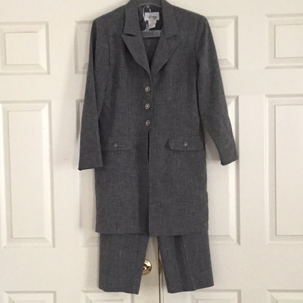 2 piece gray tweed suit has a white tweed coming through